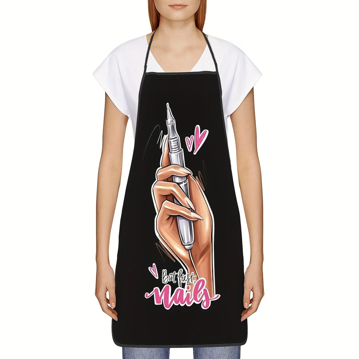 Black apron featuring a hand painting nails and the text But fast nails