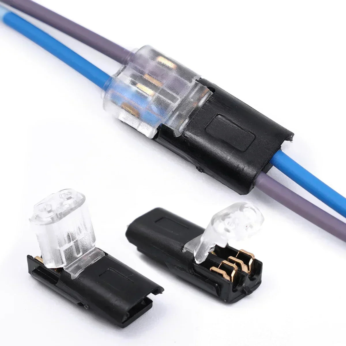 Two quick splice wire connectors showing blue and purple wires with electrical terminals