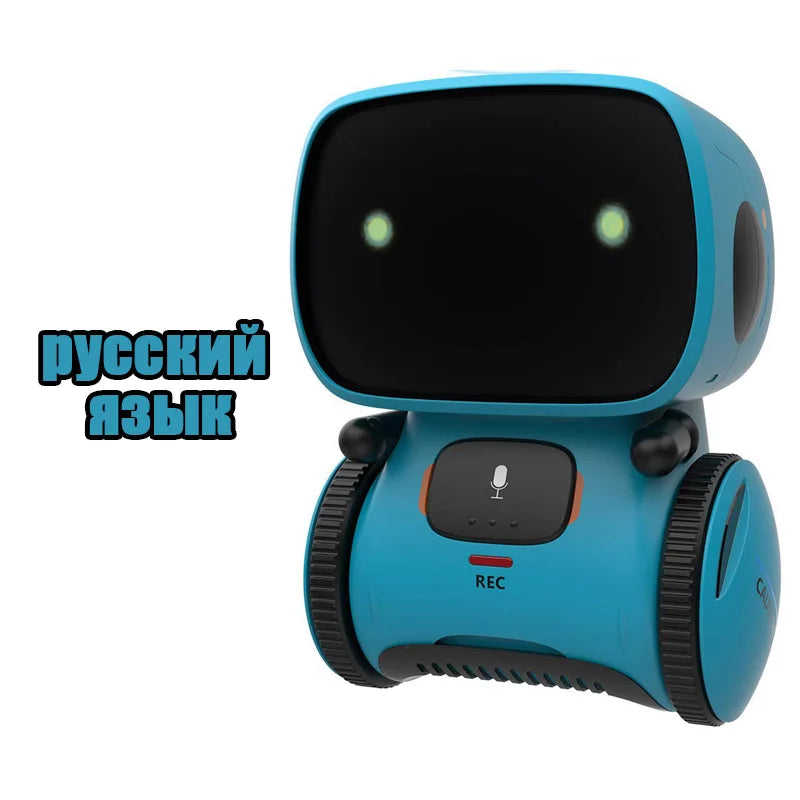 A teal robot toy with a black head and body, featuring a microphone and a language selection indicator.
