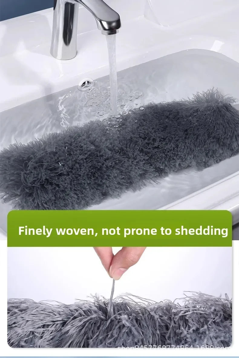 A close-up of a gray microfiber duster being used to clean a sink, highlighting its fine weave.