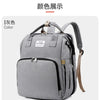 A gray backpack for a mummy package showing the color display.