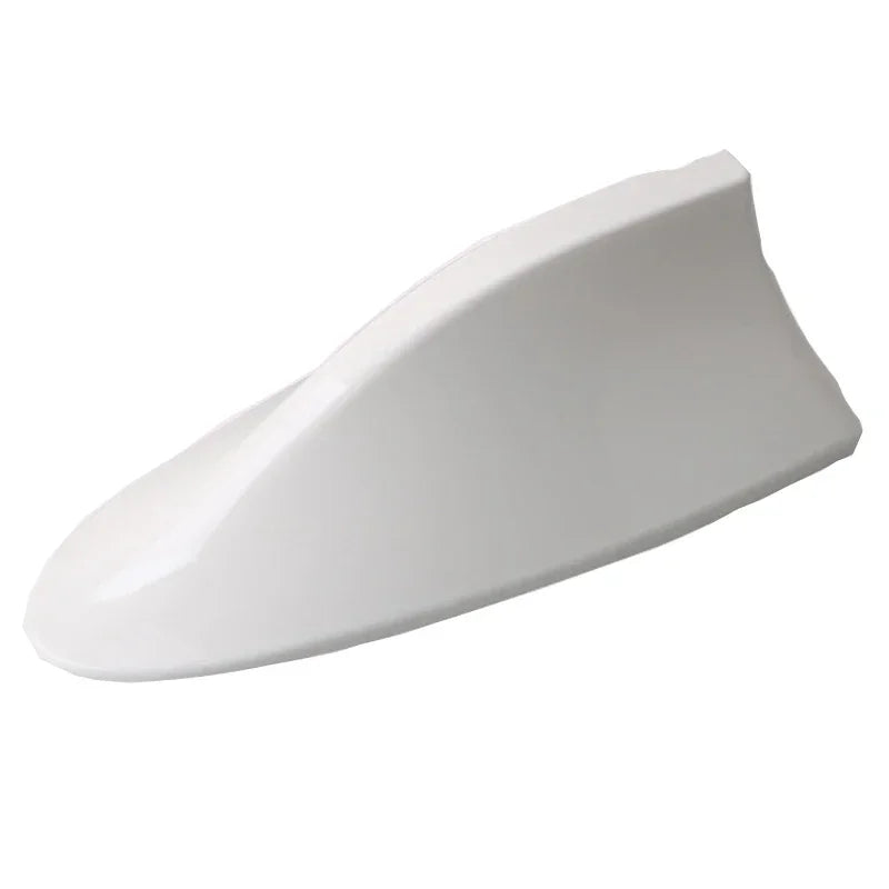 White shark fin car antenna with FM/AM signal enhancement