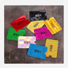 A collection of ten brightly colored RFID blocking card sleeves, including red, yellow, green, purple, and blue.