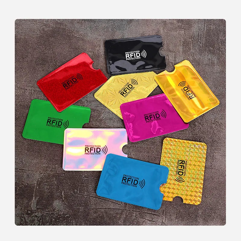A collection of ten brightly colored RFID blocking card sleeves, including red, yellow, green, purple, and blue.