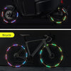 A motorcycle and a bicycle are shown with reflective wheel rim stickers for night safety and style.