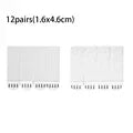 Twelve pairs of removable adhesive picture hanging strips, measuring 1.6x4.6 cm each.