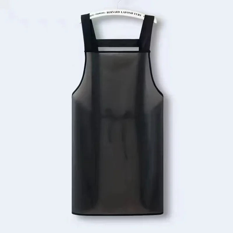 A black waterproof kitchen apron with a mesh back and white tag.