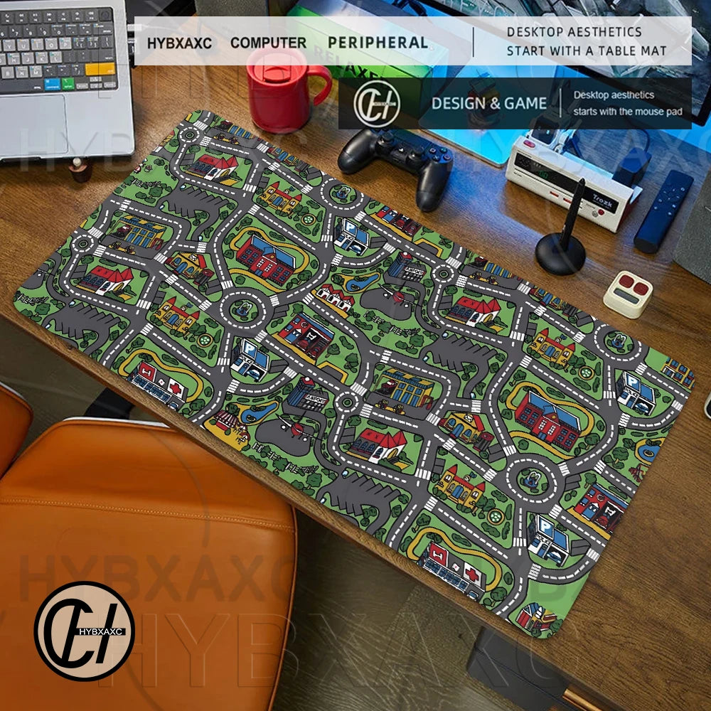 A large gaming mouse pad featuring a vintage city road design with houses and streets on a wooden desk.