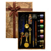 A vintage calligraphy fountain pen set with a wax seal stamp kit presented in a brown paper box.