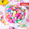 A bowl filled with assorted polymer clay beads in various colors and summer fruit designs for jewelry making