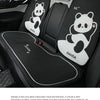 Black car seat covers featuring panda designs and headrest pillows for a comfortable driving experience.