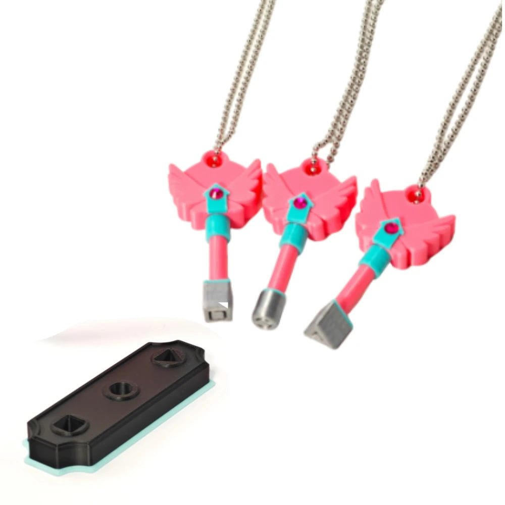 Set of four pink and teal dagger key necklaces with silver pendants