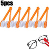 Five orange microfiber tools used for cleaning eyeglasses.