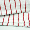 White and red striped lint-free kitchen dishcloths stacked together