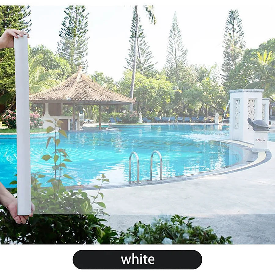 A white self-adhesive window screen mesh with a zipper is shown in an outdoor pool setting.