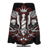 Black waterproof hair cutting cape featuring a detailed red and white ornamental design.