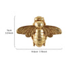 Golden bee-shaped resin wall decor with wings and body