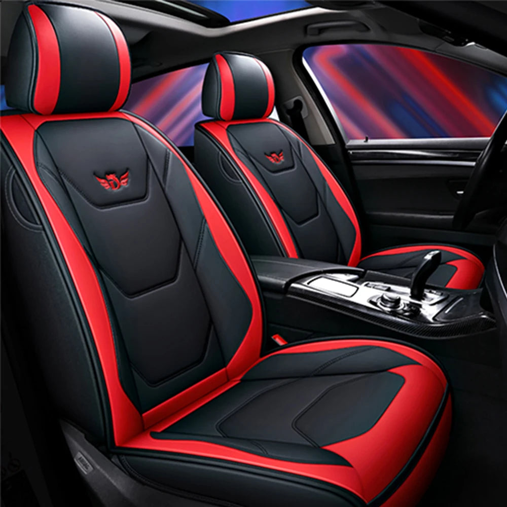 Black and red leather car seat covers with airbags, shown inside a vehicle cabin.