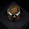 A black metal spinner dice cube featuring a gold-colored dragon design and a visible pentagram symbol.