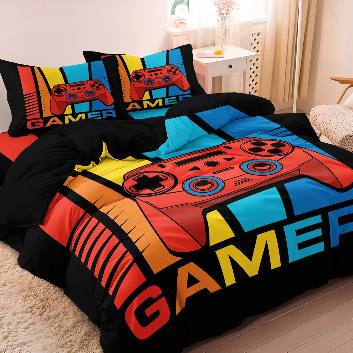 A black duvet cover featuring a vibrant gamer theme with controller and keyboard graphics.