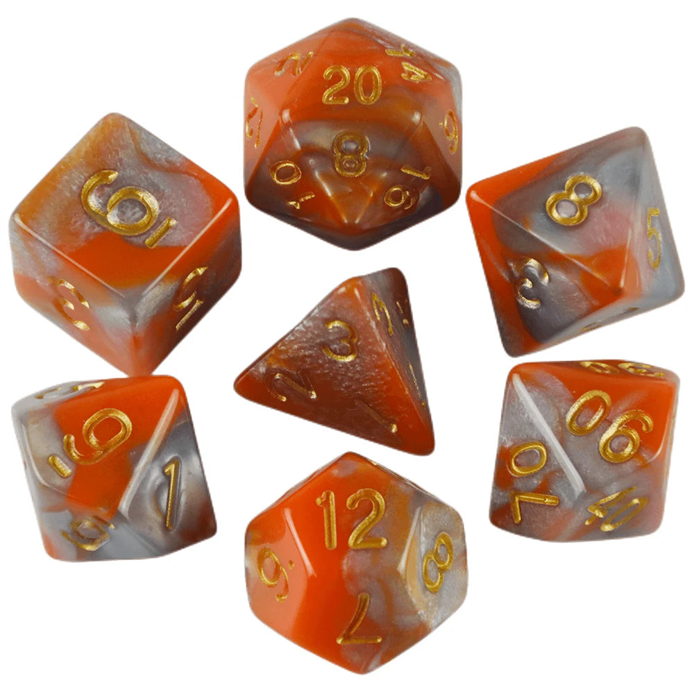 A set of seven polyhedral dice in various shades of orange and amber glass.