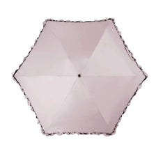 A light pink portable five-fold lace umbrella with a geometric pattern.