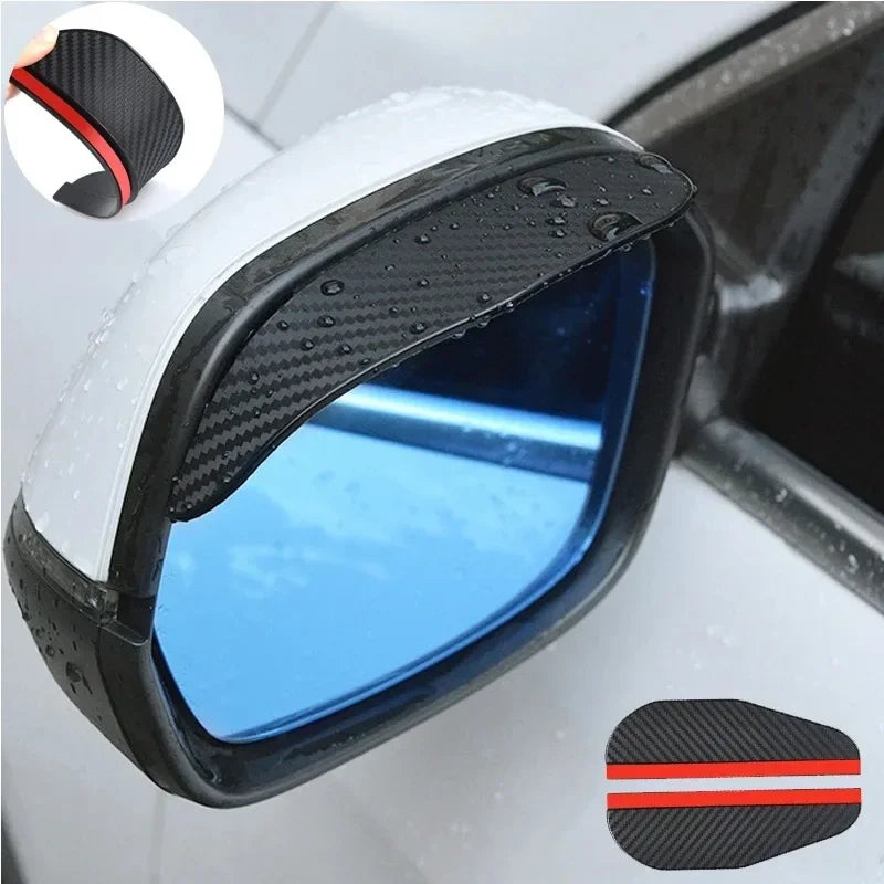 Close-up view of a carbon fiber car side mirror rain and sun visor with a black frame and blue tint.