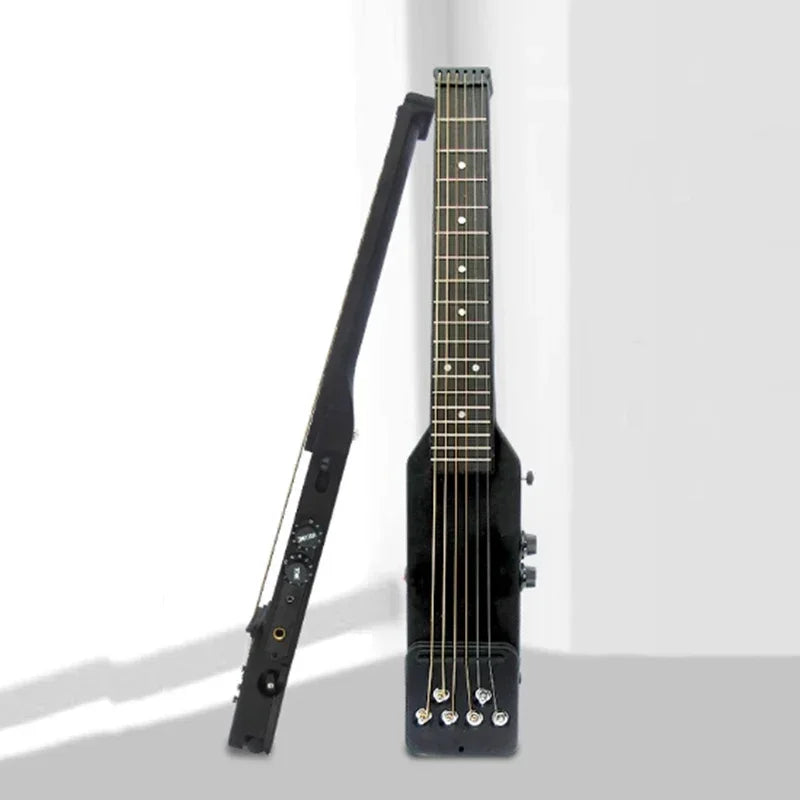 A black silent electric acoustic guitar with an active pickup, shown vertically.