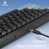 A close-up view of a compact 60% wired mechanical gaming keyboard with RGB backlighting and a Type-C connection port.