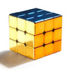 A glossy gold and blue electroplated 3x3 magnetic speed cube viewed from above.