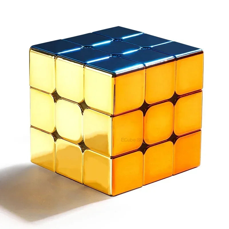 A glossy gold and blue electroplated 3x3 magnetic speed cube viewed from above.