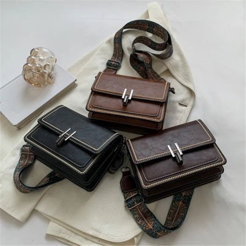 A collection of brown and black leather mini cross-body bags with adjustable straps displayed on a white background.
