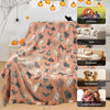 Weiche orange-graue Korallen-Fleecedecke mit Halloween-Motiven für den Outdoor-Einsatz.