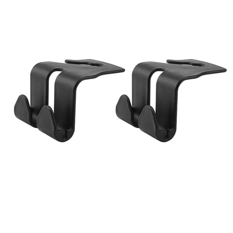 A pair of black universal car headrest hooks for storing bags, clothes, and other items.