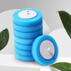 Stack of bright blue disposable aromatherapy toilet cleaners with white lids and a wall-mount holder