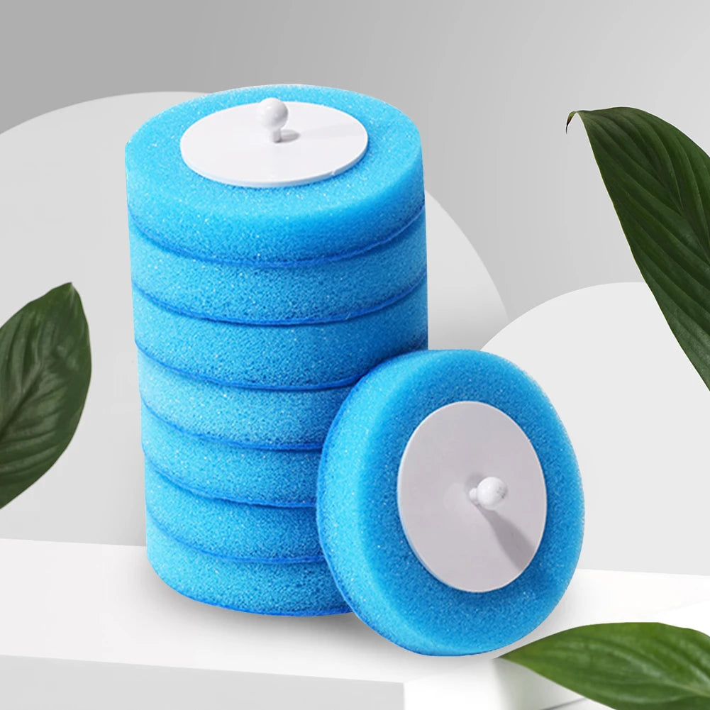 Stack of bright blue disposable aromatherapy toilet cleaners with white lids and a wall-mount holder