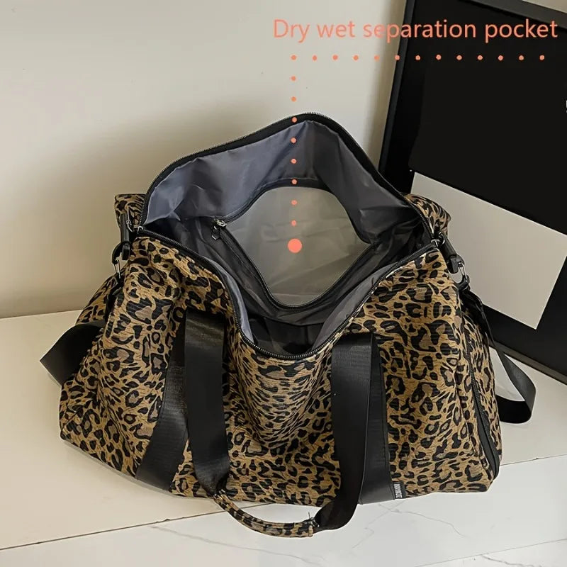A leopard print weekender tote bag with a dry wet separation pocket shown open.