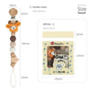 A wooden pacifier clip with a chain of crochet beads and a gift box featuring a baby theme.