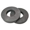Two industrial-grade ceramic ring magnets, approximately 60mm in outer diameter, are shown.