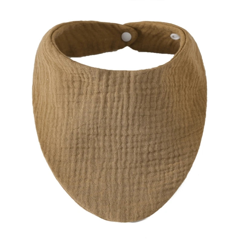 A round, olive green organic cotton muslin baby bib with an absorbent band around the neck.