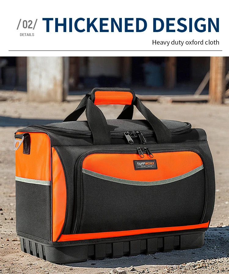 An orange and black heavy duty oxford cloth tool bag with a molded base sitting on dirt ground.
