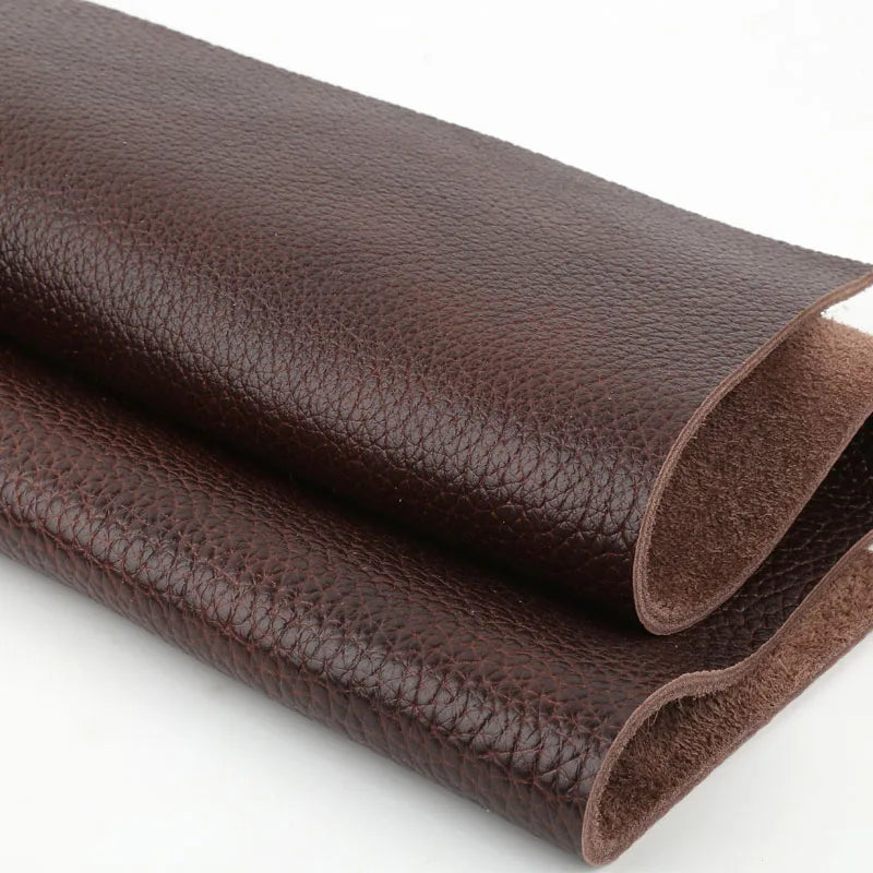 Roll of dark brown top-grain cowhide leather fabric, 4mm thick.
