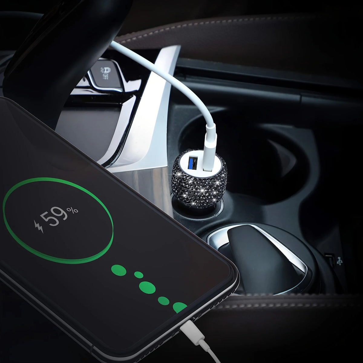 A smartphone screen displaying 59% battery charge is shown next to a rhinestone dual USB car charger in a car interior.