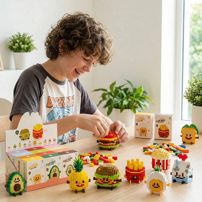 A child is assembling a set of cute micro building blocks shaped like desserts and characters on a wooden table.