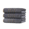 A stack of three gray gold-striped coral fleece towels.