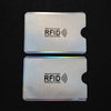 Two translucent plastic RFID protection cards are shown against a black background.