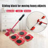 Red sliding block for moving heavy objects shown with a lifting bar and multiple blocks on a wooden floor.
