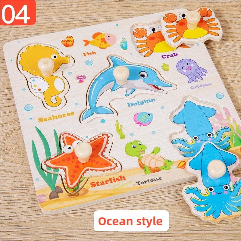 A wooden puzzle set featuring various sea creatures like a dolphin, crab, starfish, and octopus.