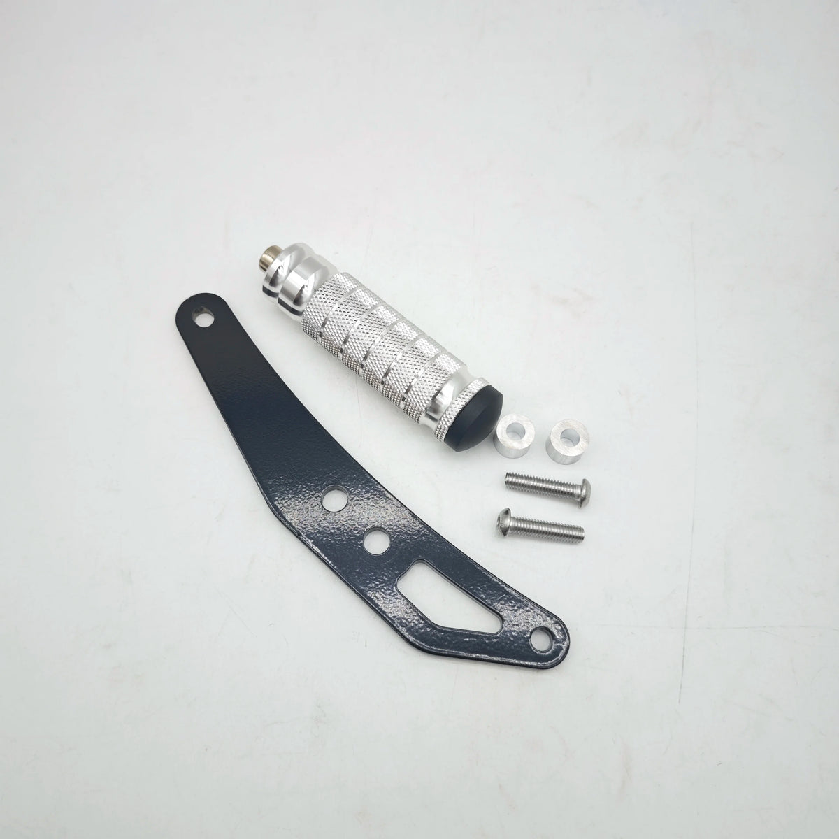 CNC aluminum foot pegs and mounting hardware for electric dirt bikes