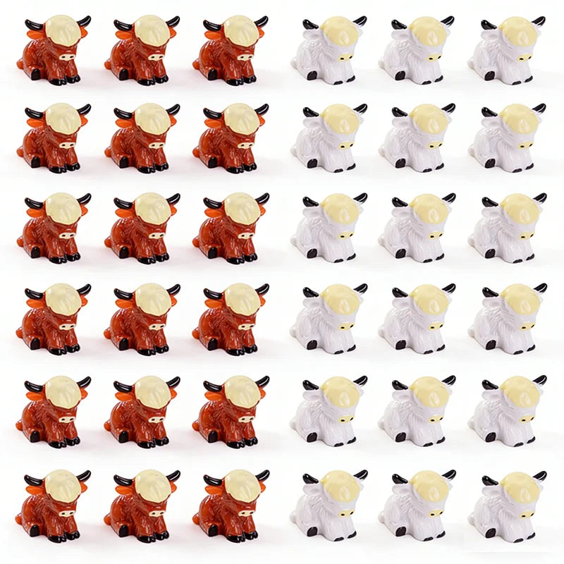 A set of adorable resin Highland cow figurines in brown and white colors for desk and garden décor